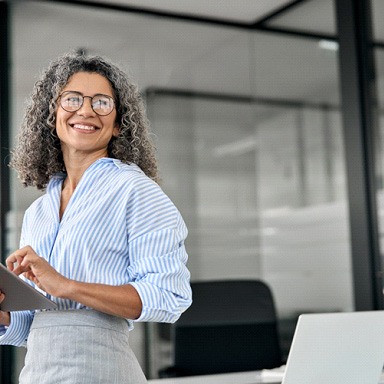 Woman smiling in an office