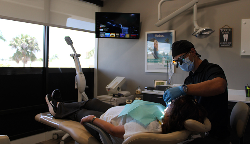 Doctor Perez treating a dental patient